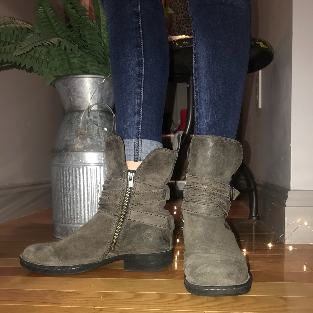 Gray leather boots with a low to mid heel.